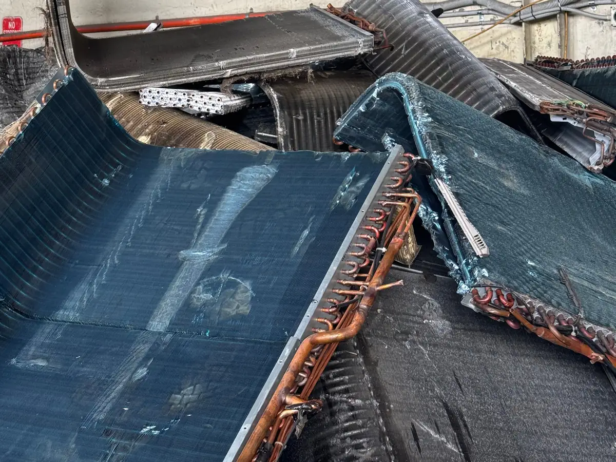 Air conditioner coils with aluminium fins on copper tube, sorted at the Ingleburn yard