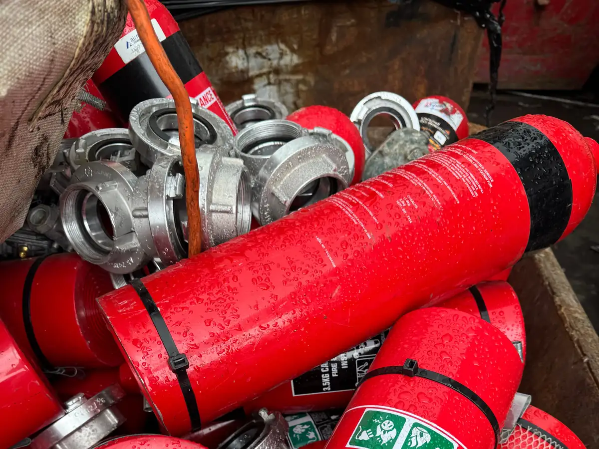 Cast aluminium valve heads with fire extinguisher bodies at the Ingleburn yard