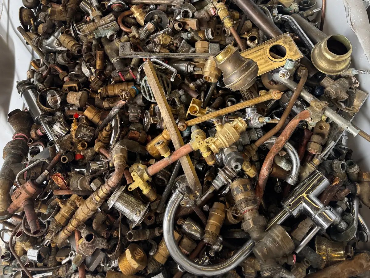 Crate of brass taps, valves and fittings at the Shine Motor yard in Ingleburn